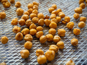 Golden, crunchy chickpeas in air fryer basket